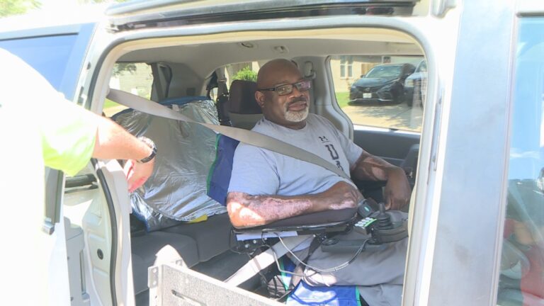 Rudder football coach receives wheelchair accessible van