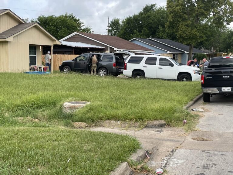 Bryan street shut down after law enforcement serve search, arrest warrants