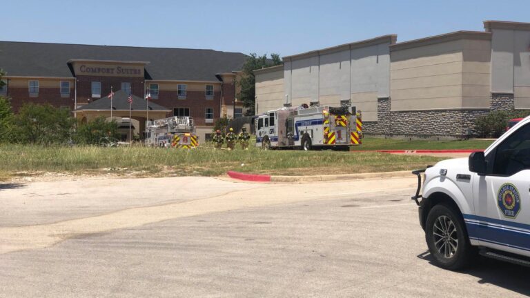 Crews work to stop gas leak at College Station hotel.