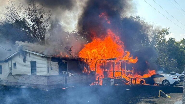 Fire engulfs home, vehicles in Calvert neighborhood