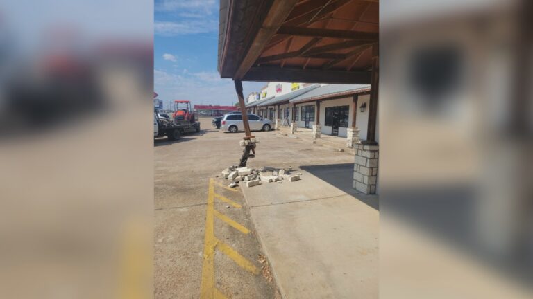 Truck damages pillar outside Bryan business during a hit and run