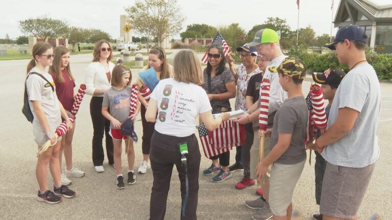 Flags placed on the graves of veterans at the Aggie Field of Honor ahead of Veterans Day