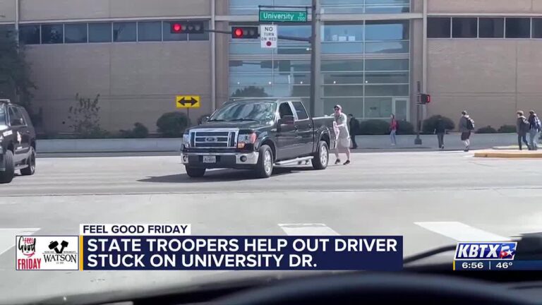 State troopers help driver push truck to safety