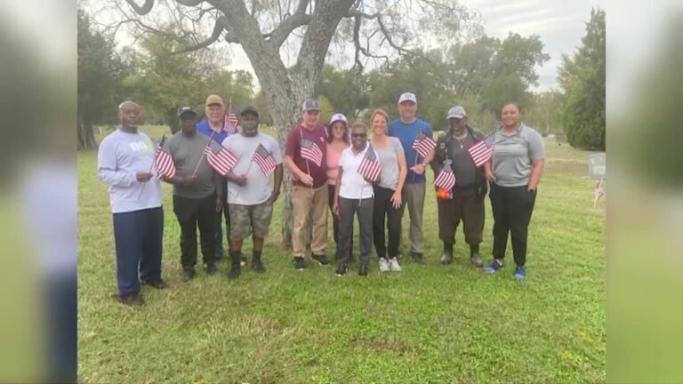 Disabled American Veterans place flags at Bryan cemetery