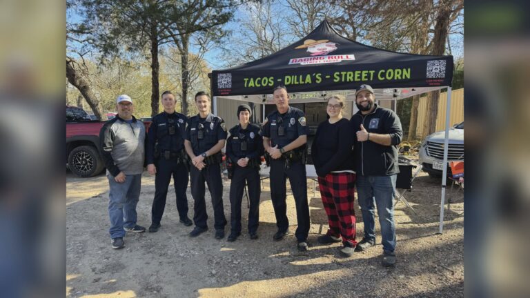 Raging Bull Street Tacos and local law enforcement deliver 25 Christmas meals