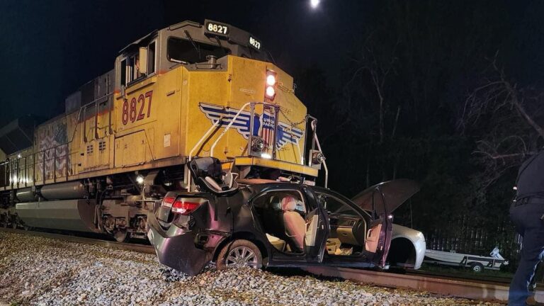 Train strikes car that was stuck on tracks near Downtown Bryan