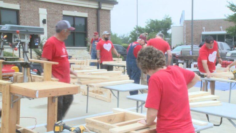 Keller Williams celebrates RED day by building beds for local non profit