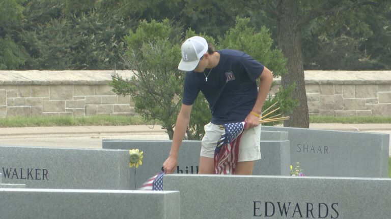 Flag placement event held at the Aggie Field of Honor