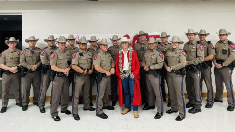 State troopers surprise son of fallen DPS Trooper Chad Walker at his graduation